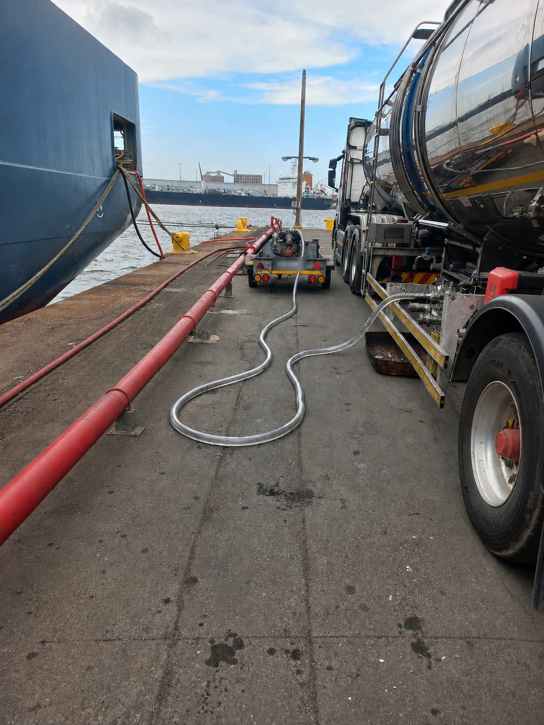 Bulk Mono-ethylene Glycol transferred from a road tanker to a platform supply vessel alongside in the Port of Durban, through a quayside pump and manifold – Afrishore integrated mobilisation for a Tidewater campaign offshore Pemba, Mozambique.